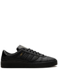 adidas Puig Indoor Black Out Sneakers — Black — Size US M 6.5 - US W 8 — Front View