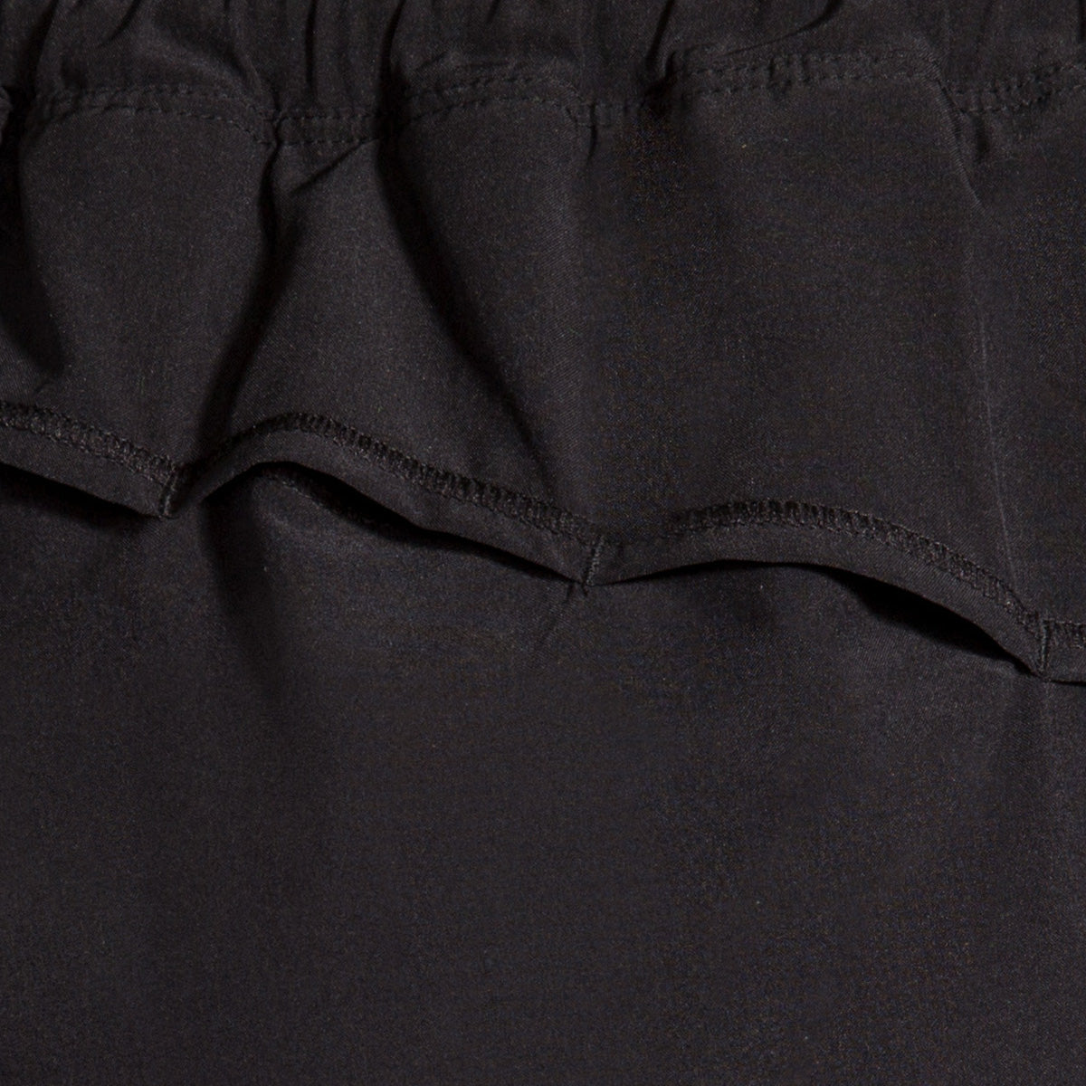 Brooks Carbonite 4" Short — Black - Nightlife — Size Small — Lifestyle View