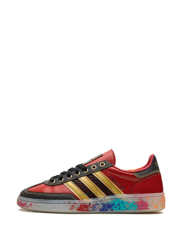 adidas Handball Spezial S.E.E.D. - Scarlet Gold Paint Splatter Sneakers — Red — Size US M 9.5 - US W 11 — Detail View